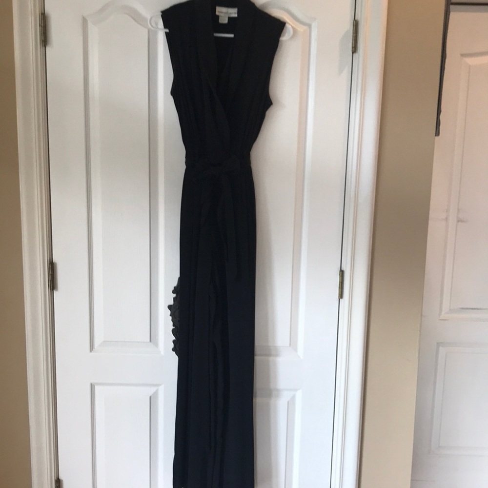 Beautiful sleeveless black vintage palazzo pant jumpsuit. Size 8